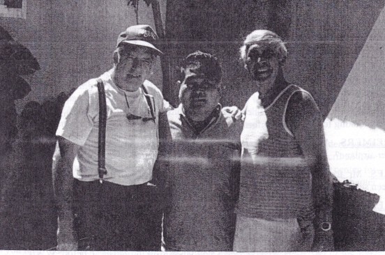 Bill Prymak and Joe Gervais pause with the iconic Earhart eyewitness Bilimon Amaron at Amaron's Majuro home in 1991. 